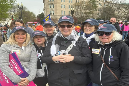 WRJ members smiling at SCOTUS