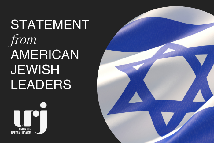 Photo of an Israeli flag that says "Statement from American Jewish Leaders" and has the URJ logo on it