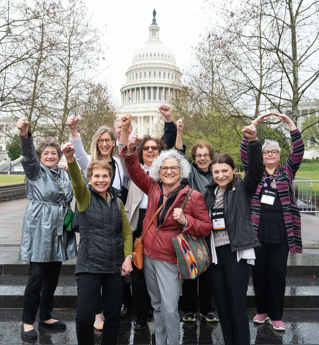 women and Phil McOsker from Ohio in front of the Capitol building in DC