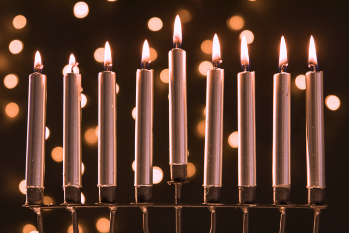 a hanukkiah with all nine candles lit