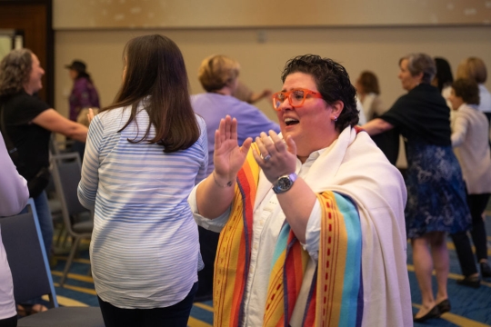 Joy Villarreal-Belford clapping along to Miriam's Song at WRJ SJC 2025