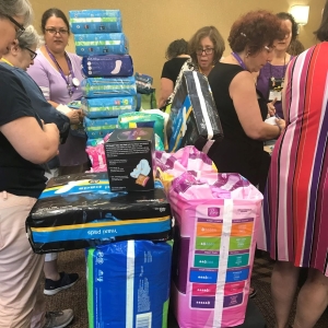 Women collecting tampons and pads to donate to shelters and those in need.